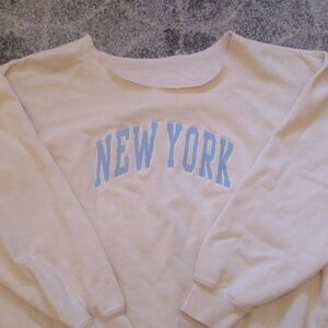 cream and blue ny cut crewneck